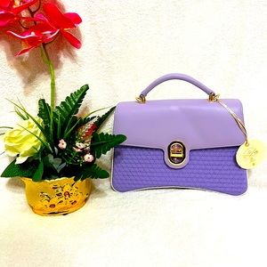 NWT 2 pockets Authentic Matmazel designed purple hand bag .